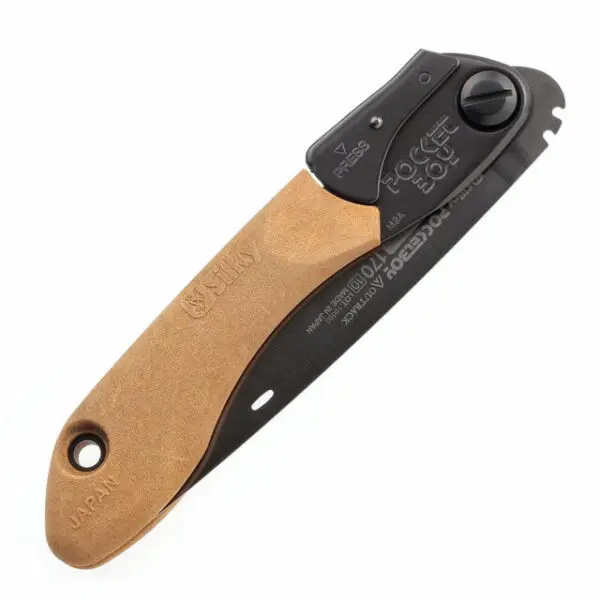 A folding knife with a black blade and a tan handle, featuring a pocket clip and thumb stud for easy opening. the handle has the brand "SILKY POCKETBOY PROFESSIONAL 170MM - OUTBACK EDITION" embossed on it, and the blade is marked with "440a stainless japan.