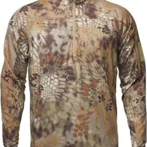 A Kryptek Valhalla Long Sleeve Zip Highlander with a quarter-zip front. The pattern consists of earthy tones, including shades of brown, green, and tan, designed to blend into natural environments. The shirt features a high collar and a small patch on the upper arm.