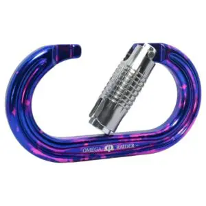 A close-up of an Omega Pacific Raider+ Aluminum Keylock 3-Stage Quik-Lok Ultra-Violet carabiner. The carabiner is primarily blue with pink splashes and features a silver locking mechanism. The brand name is visible on the side.