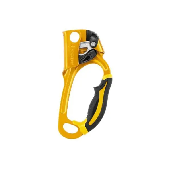 A yellow and black PETZL Handled Ascender with a handle grip, designed for climbing or industrial applications. The device features a locking mechanism and multiple attachment points for secure rope management.