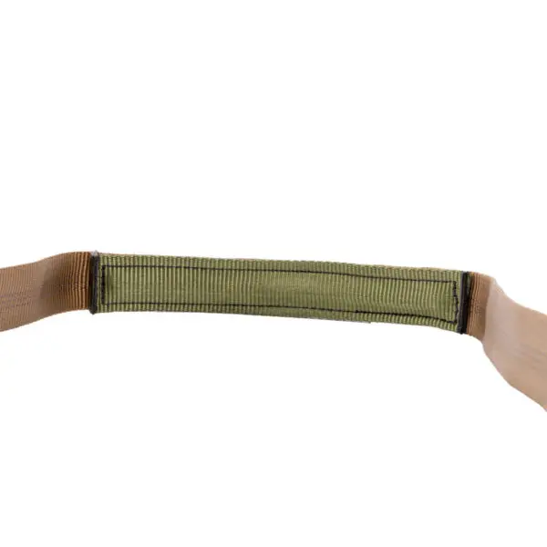 A close-up view of a belt or strap. The central portion is green and textured, while the ends are tan. The Ape Canyon Outfitters Single Step Aider appears to be made of durable fabric material.