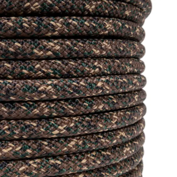 Close-up of a tightly coiled, multicolored braided rope. The Ape Canyon Outfitters 9.5mm Ghillie features an intricate pattern of brown, tan, and green strands. The image captures the texture and uniformity of the carefully arranged coils.