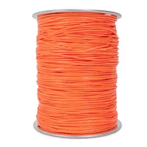 A large spool of Ape Canyon Outfitters 2.2mm Orange Oasis is shown. The cord is neatly wound around the spool, which has silver-colored rims at the top and bottom.
