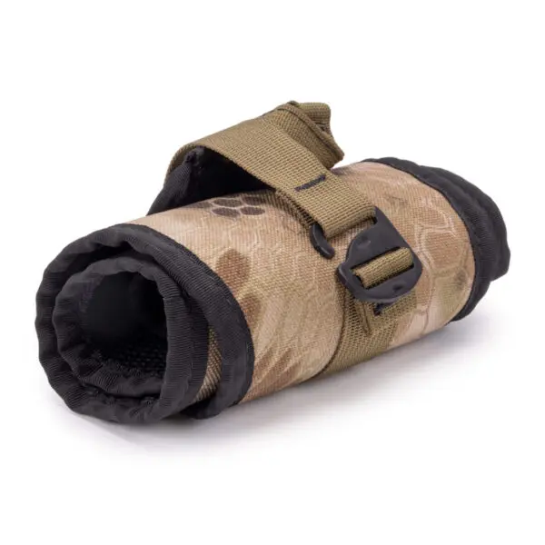 A rolled-up Ape Canyon Outfitters Lazy Hunter Band Kryptek Highlander with a black buckle and tan strap, designed for outdoor activities. The collar features a rugged design suitable for durable use.
