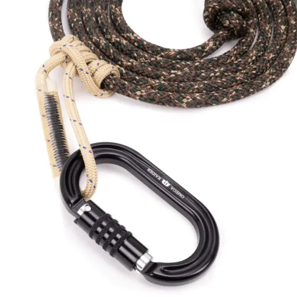 An Ape Canyon Outfitters 9.5mm Ghillie Lineman Belt Kit attached to a black carabiner with a yellow lanyard and stitched protective sleeve. The carabiner features a twist-lock mechanism and has "Quick Alpine" engraved on its side.