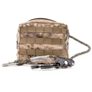 The Ape Canyon Outfitters One Stick Rappel Kit has a camouflage-patterned tactical pouch with MOLLE webbing, features a paracord strap attached to it, terminating in metal carabiners and a rope clasp mechanism. The pouch appears to be used for outdoor or military purposes.