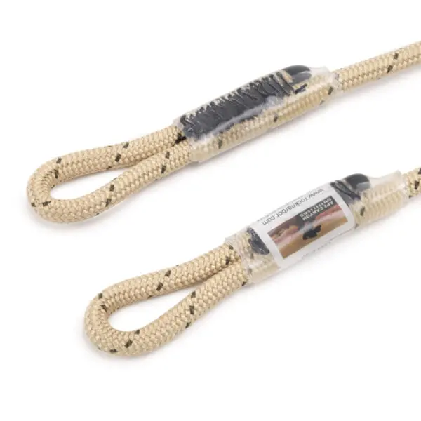 Two Beige-colored Ape Canyon Outfitters 6mm TRC Eye to Eye Hitch Cord 23" with black specks, featuring sewn termination loops at each end. The loops are covered with clear plastic shrink wrap, and one section has a label attached, displaying product information.