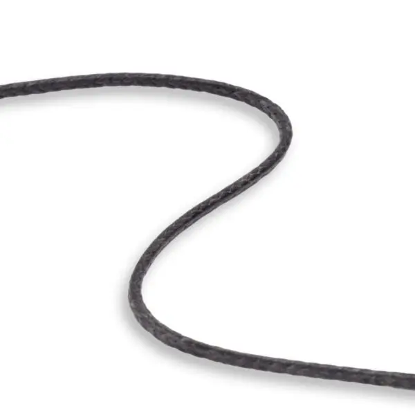 A close-up view of a thin, black, braided Ape Canyon Outfitters 2.2mm Arachnid, curving smoothly across a white background. The rope's texture and twists are visible, highlighting its interwoven fibers.