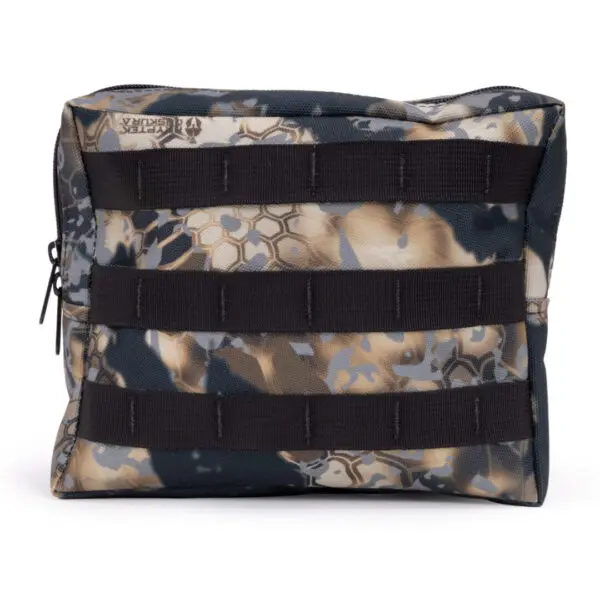 A camouflage-patterned tactical pouch with a zippered closure, featuring horizontal black webbing straps on the front. The pattern includes shades of tan, green, gray, and black with hexagonal shapes mixed in. The Ape Canyon Outfitters One Stick Saddle Pouch Obskura Skyfall appears to be durable and functional.
