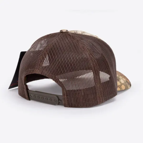 The image shows the back view of a brown and beige mesh Ape Canyon Outfitters Richardson Trucker Hat. The hat features a plastic adjustable snapback closure and a camouflage pattern on the front panel. A black hanging tag is attached to the hat.