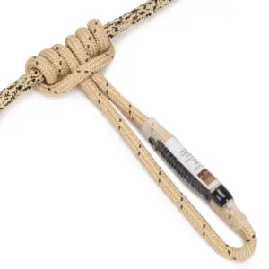 A tan and black speckled rope tied into a secure, intricate knot around another braided rope. A section of the rope loop includes a label, featuring text and color coding, wrapped and secured with transparent material. The background is white. 
The product shown is the Ape Canyon Outfitters 8mm Resc Tech Saddle Hunting Combo with 3 Stage Quick Lock Carabiners.