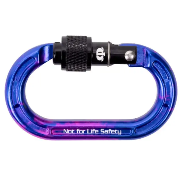 An Omega Pacific Micro Raider Aluminum Keylock Screw-Lok with a locking mechanism at the top. The words "Not for Life Safety" are inscribed on its side, indicating it is not suitable for safety-critical uses. The carabiner has a mix of blue, purple, and pink hues.