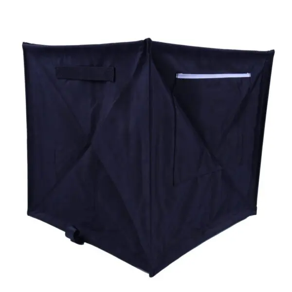 A black RNA COLLAPSIBLE THROWLINE CUBE with a fabric exterior. The cube features a handle on one side and a zippered pocket on another side for additional storage. It is shown standing upright with its sides fully expanded.