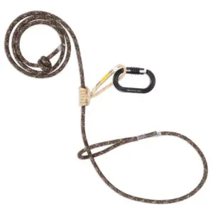 A coiled Ape Canyon Outfitters 8mm Resc Tech Tether System with Screw Lock Carabiner. The rope is a speckled pattern with shades of brown and black, and the carabiner is black with a gold connection piece. The setup appears ready for use in climbing or safety harnessing.