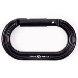 A black Omega Pacific Raider Aluminum Keylock Straight Gate - Black with an oval shape and a secure locking mechanism is pictured against a white background. "OMEGA RAIDER" is written in white on the bottom of the carabiner.