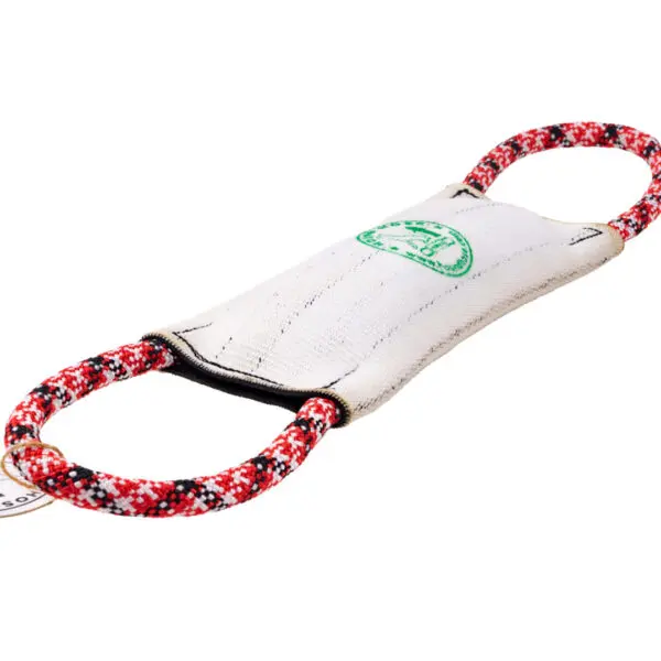 A Hound Hose Dog Tug Toy with black stitching featuring two red and black rope handles on each end. The fabric is reinforced and has a green logo printed on it. The toy is suitable for dog play and training exercises.
