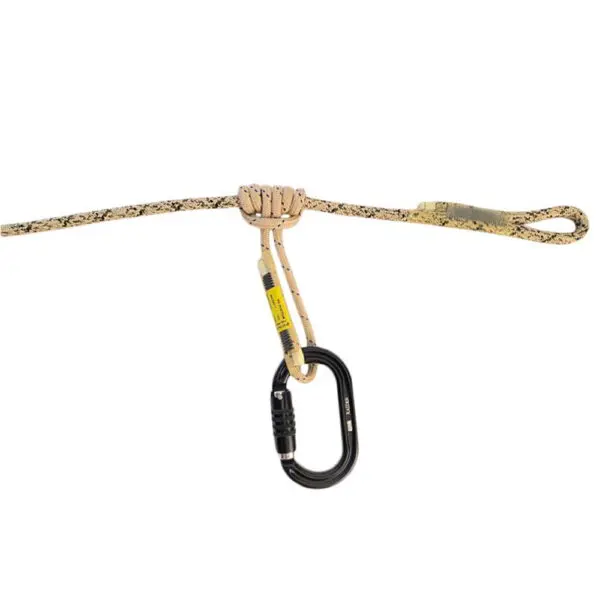 A beige and black Ape Canyon Outfitters 8mm Oplux Tether System with 3 Stage Quick Lock Carabiner tied with a specific knot, connected to a black carabiner. The carabiner, which is fastened to the knot, has a locking mechanism and a label that appears to provide safety information.