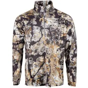 A Kryptek Valhalla Long Sleeve Zip Highlander with a high collar featuring a camouflage pattern in shades of brown, beige, white, and gray. The jacket has a zip-up front and appears to be designed for outdoor or hunting activities.