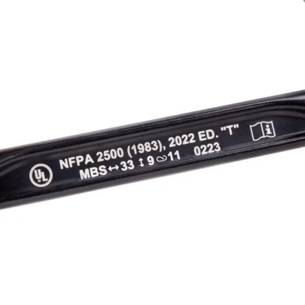 Close-up image of a black Omega Pacific Standard D Aluminum Keylock 3-Stage Quik-lok NFPA, with white text that reads "NFPA 2500 (1983), 2022 ED. 'T' MBS ↔ 33 ↑ 9 ⭠ 11 0223." The UL logo is also visible.