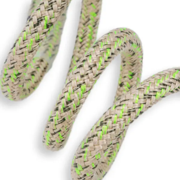 A close-up image of a coiled RNA 8mm Flex Eye & Eye against a white background. The rope features an intricate woven pattern with a combination of beige, green, and black strands, creating a vibrant, textured appearance.