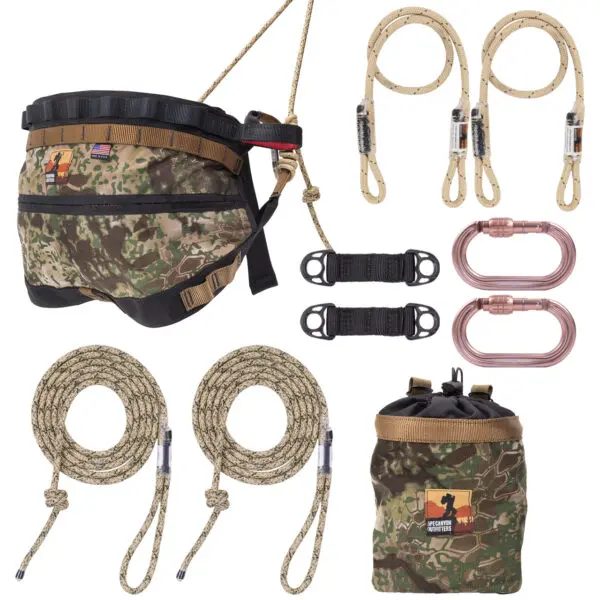 An assortment of Ape Canyon Outfitters Wood Deluxe Saddle Kit Transitional gear, including a camouflage harness, two lanyards, ropes, connectors, and a camouflage pouch. All items are displayed neatly against a white background, featuring a consistent camouflage design and high-quality materials.