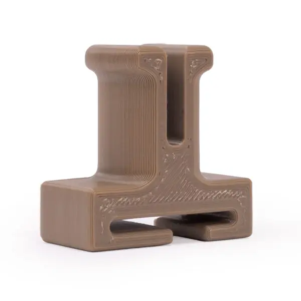 A 3D-printed, brown plastic Ape Canyon Outfitters Retrieval Post resembling an abstract T-shape is displayed on a plain white background. The object has smooth curves and distinct layers, common in 3D printed items.
