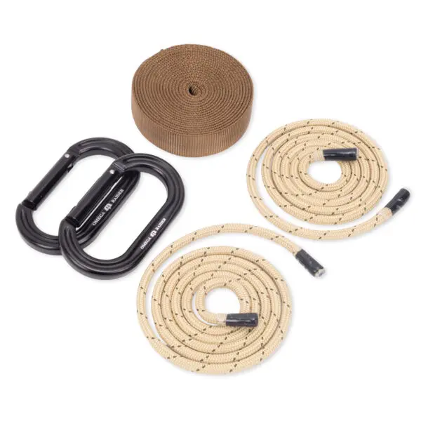 A JRB Garda Hitch Footloop Kit consisting of two black carabiners, two beige ropes with black ends, and a roll of brown webbing. The items are arranged neatly on a white background.