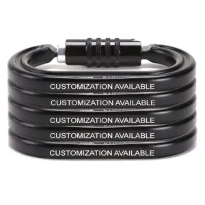 A coiled black cable bike lock with a combination mechanism. The lock is labeled with the repeated words "DIEGO - Custom Text - Test." The lock showcases a spiral design and a silver dial for code input.
