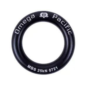 A black circular metal ring inscribed with "Omega Pacific" at the top and "MBS 25kN 0721" at the bottom, featuring the Omega Pacific logo centered at the top. This is one of the Omega Pacific Aluminum Rappel Rings.