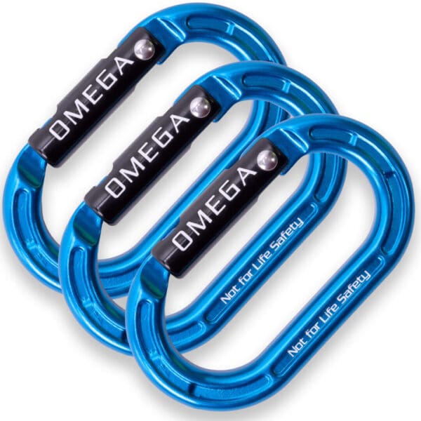 An image of three blue Omega Pacific Micro Raider Aluminum Keylock Straightgate carabiners arranged in a row. Each carabiner features a black lock with "OMEGA" printed on it. The text "Not for Life Safety" is printed along the bottom edge of each carabiner.