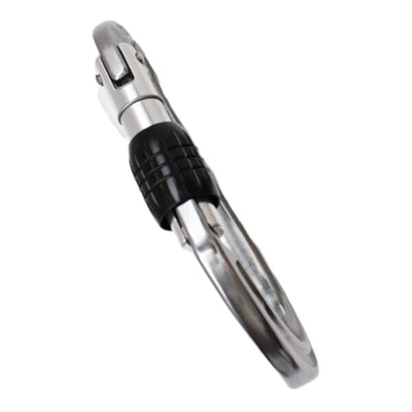 A silver Omega Pacific Phantom Aluminum Keylock Screw-Lok - Gunmetal with a black locking mechanism. The Omega Pacific Phantom Aluminum Keylock Screw-Lok - Gunmetal is oval-shaped and has a smooth, polished finish. The black lock is ridged for grip and is positioned on the gate side of the Omega Pacific Phantom Aluminum Keylock Screw-Lok - Gunmetal.