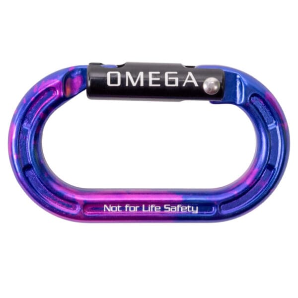 A close-up of a blue and purple oval-shaped Omega Pacific Micro Raider Aluminum Keylock Straightgate with a black locking mechanism. The word "OMEGA" is engraved on the black section, and "Not for Life Safety" is printed on the bottom part of the carabiner.