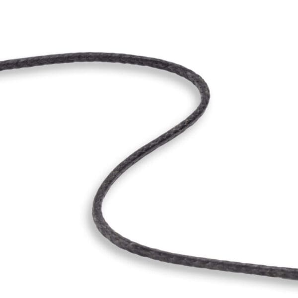 A close-up view of a thin, black, braided Ape Canyon Outfitters 2.2mm Arachnid, curving smoothly across a white background. The rope's texture and twists are visible, highlighting its interwoven fibers.