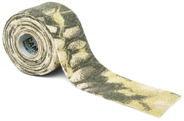 A roll of Camo Form Reusable Fabric Wrap with an earthy green and tan pattern, partially unrolled to display a textured fabric surface. The inner part of the roll has the text "CAM" visible.