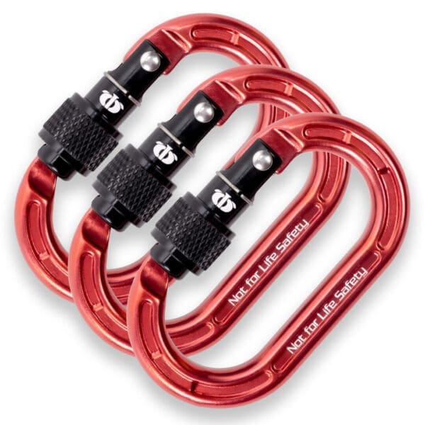 Image of three Omega Pacific Micro Raider Aluminum Keylock Screw-Lok with black locking mechanisms arranged side by side. The words "Not for Life Safety" are printed on each carabiner.
