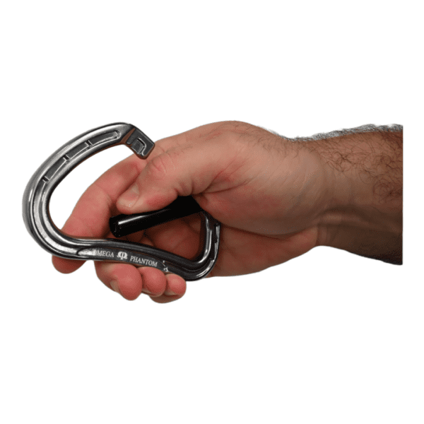 A person's hand holding a black and silver carabiner with the label "Omega Pacific Phantom Aluminum Keylock Straightgate Gunmetal." The hand is positioned as if about to clip or unclip the carabiner. The background is white.