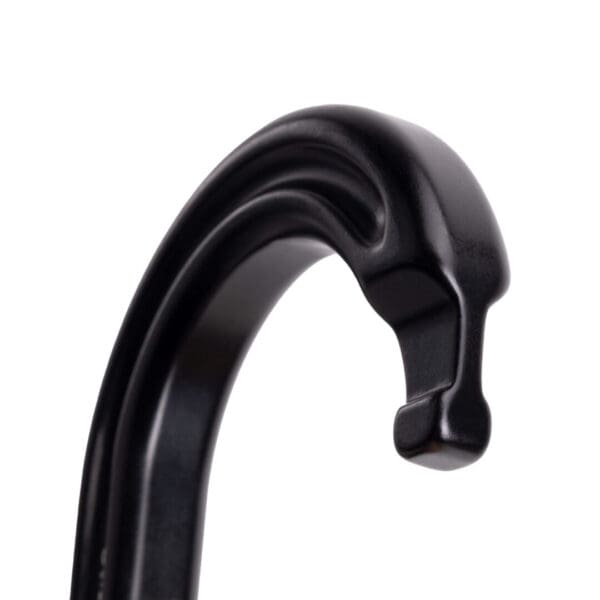 Close-up of a black Omega Pacific Raider Aluminum Keylock 3-Stage Quik-Lok NFPA - Black with a smooth, curved design. The hook is polished and shines under the light, presenting a minimalist and modern aesthetic.