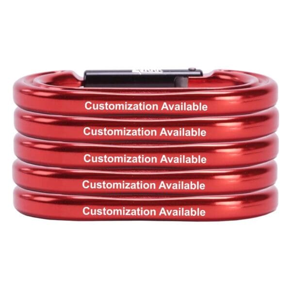A stack of Custom Omega Pacific Raider Aluminum Keylock Straight Gate (5 Pack) with the text "Customization Available" printed on each. The carabiners are arranged horizontally, with five in total, showcasing their metallic finish.