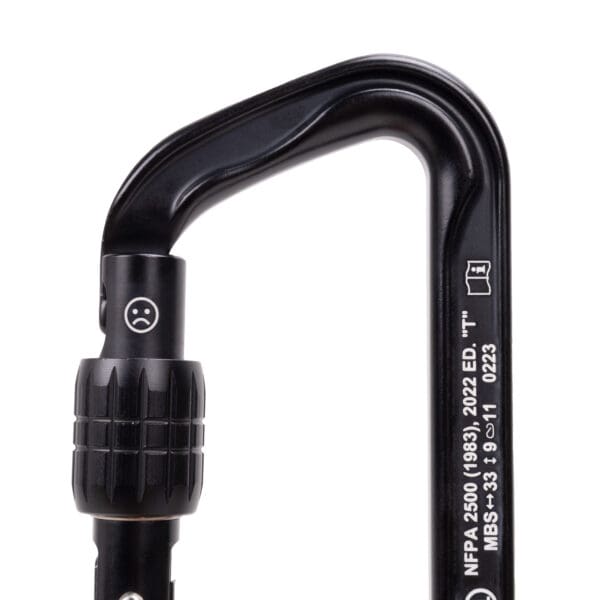 Close-up of a Custom Omega Pacific Standard D Aluminum Keylock Screw-Lok NFPA (5 Pack) with a locking mechanism, featuring standardized text and symbols for safety and compliance. The carabiner is partially open, showcasing its D-shaped design and rugged build, suitable for climbing or industrial use.